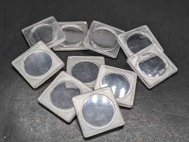 10 assorted plastic 2 X 2 coin holders