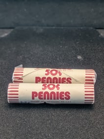 Two Unopened Rolls Of Lincoln Memorial Cents. One End Shows A 1982-D.
