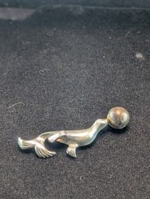 Woman's Vintage Sterling Silver Seal Balancing Ball Brooch Marked Sterling Lang. Weighs 0.25 Toz