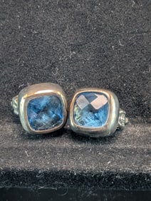 Woman's Sterling Cushion Cut Blue Topaz Clip Fastened Earrings. Marked 925. Weighs 0.39 Toz (12.2