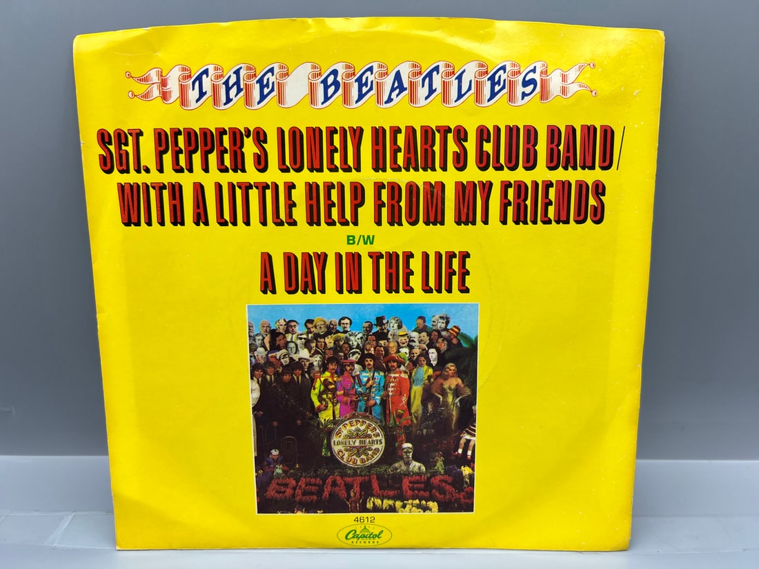 1978 The Beatles Sgt. Pepper's Lonely Hearts Club Band/With A Little Help From My Friends 45 RPM: 1978 The Beatles Sgt. Pepper's Lonely Hearts Club Band/With A Little Help From My Friends 45 RPM Record - 4612 - Records have not been tested by the auction house for play quality. All items are sold 