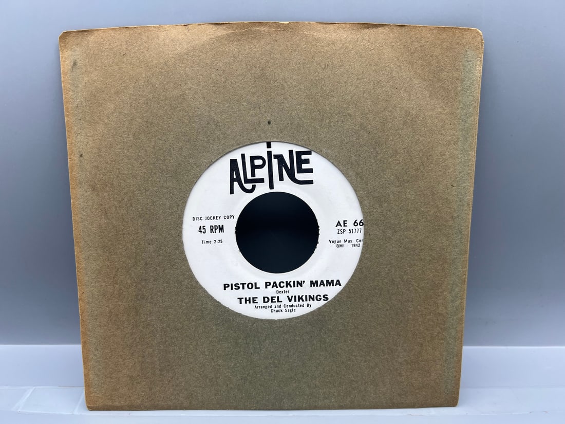 1960 The Del Vikings Pistol Packin Mama/The Sun Promo 45 RPM Record - AE 66: 1960 The Del Vikings Pistol Packin Mama/The Sun Promo 45 RPM Record - AE 66 - Records have not been tested by the auction house for play quality. All items are sold as is.