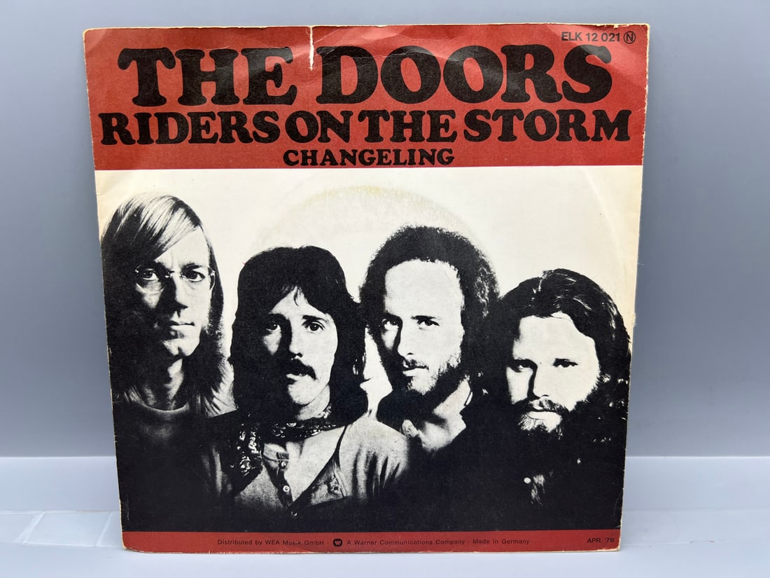 1976 The Doors Riders On The Storm/Changeling 45 RPM Record - ELK 12021 - German Reissue: 1976 The Doors Riders On The Storm/Changeling 45 RPM Record - ELK 12021 - German Reissue - Records have not been tested by the auction house for play quality. All items are sold as is.