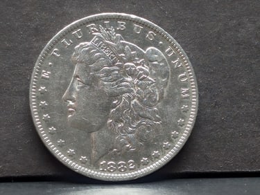 **AU+** 1882-O/S Morgan Silver Dollar