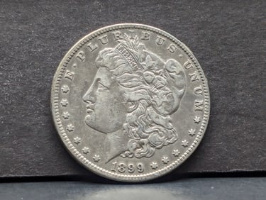 1899-O Morgan Silver Dollar w/ Mirco-o