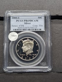 2000 S Silver Kennedy Half. Slabbed by PCGS, top grader, as Proof 69, Deep Cameo.