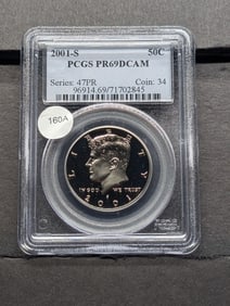 2001 S Silver Kennedy Half. Slabbed by PCGS, top grader, as Proof 69, Deep Cameo.
