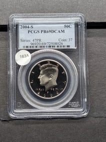 2004 S Silver Kennedy Half. Slabbed by PCGS, top grader, as Proof 69, Deep Cameo.