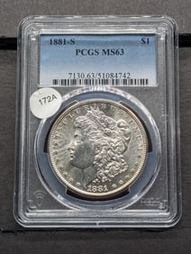 1881-S Morgan Dollar. Slabbed by PCGS, top grader, as MS63. Very bright white coin deserving of a