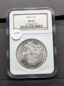 1884-O Morgan Dollar. Slabbed by NGC, top tier grader, as MS63. Very bright white coin.