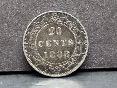 1888 Newfoundland 20 Cent piece. XF. A tougher date in great shape.