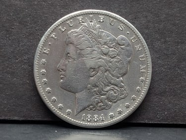 1884-S Morgan Dollar. Much better date.