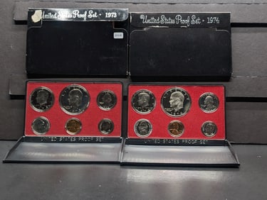 1973-S and 1974-S US Proof Sets in original boxes. Both have Eisenhower $1s. GEM.