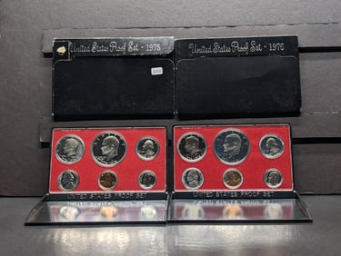 1975-S and 1976 S US Bicentennial Proof Sets in original boxes. Both have Eisenhower $1s. GEM.
