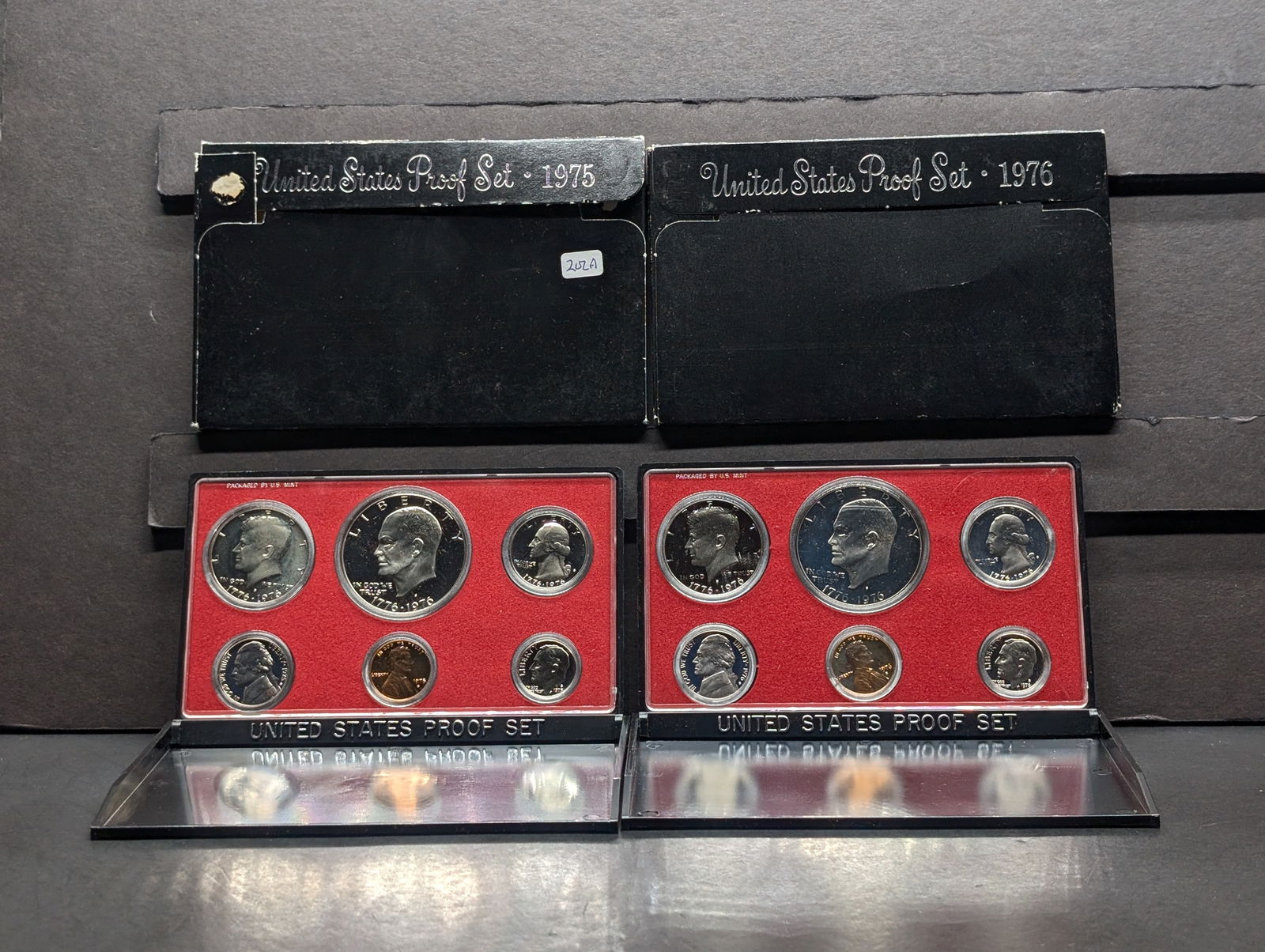 1975-S and 1976 S US Bicentennial Proof Sets in original boxes. Both have Eisenhower $1s. GEM. (1 of 5)