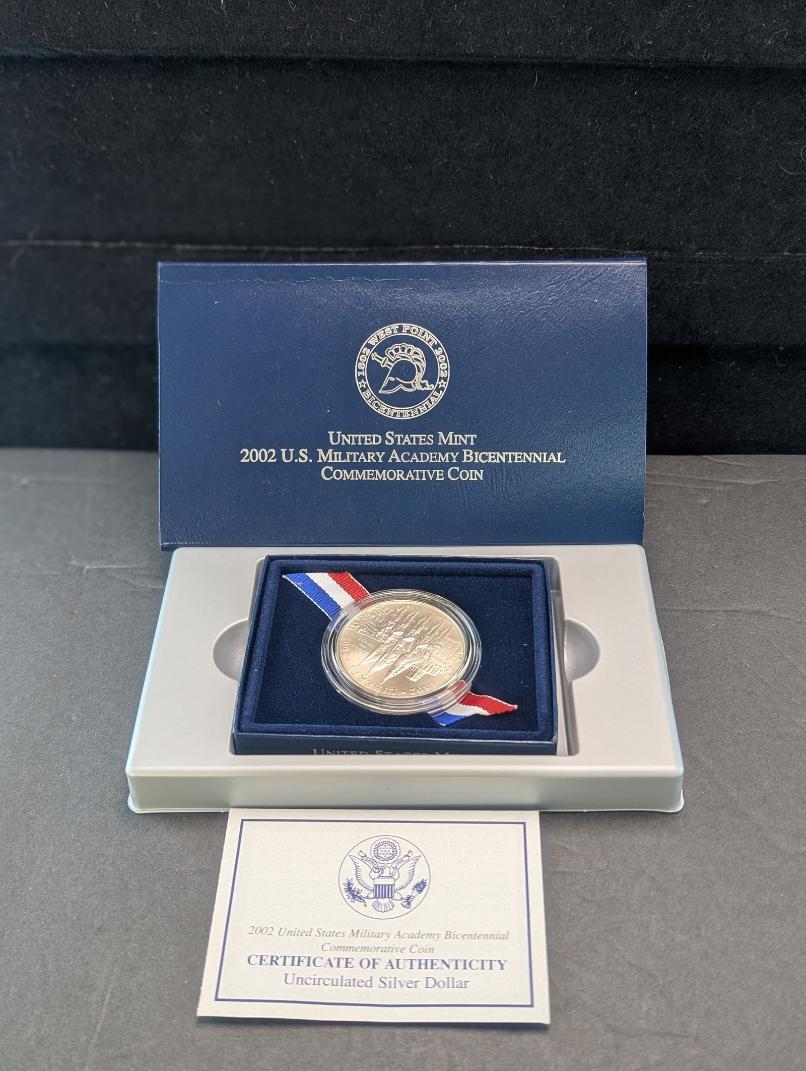 2002W Gem BU Military Academy Bicentennial 90% Silver Commemorative Dollar. OGP/COA. ONLY 500k (1 of 3)