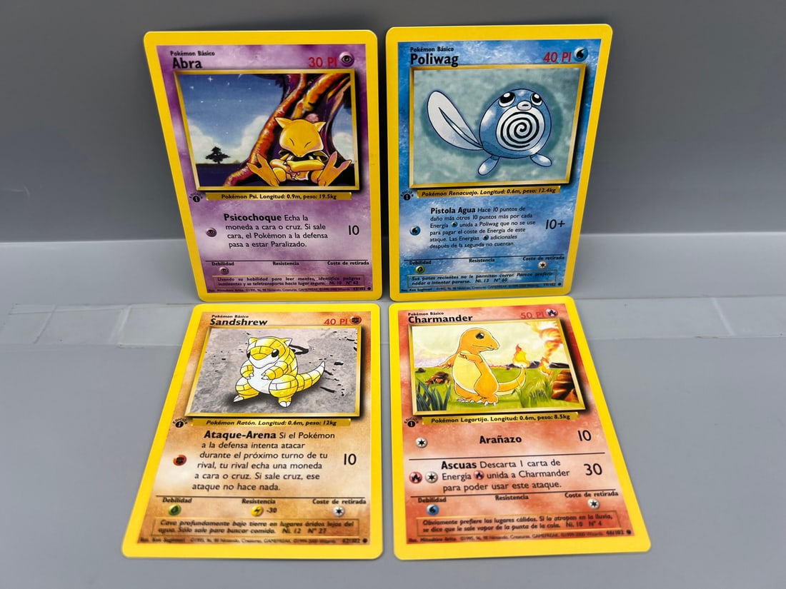Lot of (4) 1999 Pokemon 1st Edition Trading Cards - Varying Conditions (1 of 2)