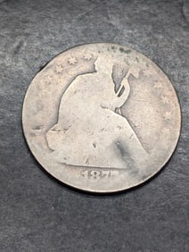 **AVERAGE CIRC** 1877 w/ Motto Seated Liberty Half Dollar