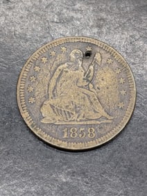 1858 Quarter  interesting color hole