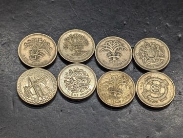 10 British pounds, 5 different dates: 83,84,85,90,91,96,97, and 05.