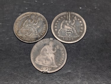 Three Seated Dime Lover Tokens: 1851, 1877, and 1890. Stylized letters or engravings on reverse.