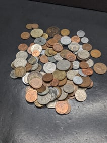 16 ounces plus foreign coins. Nice older mix.