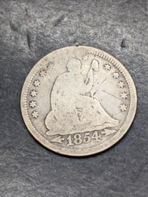 **AVERAGE CIRC** 1854 w/ Arrows Seated Liberty Quarter