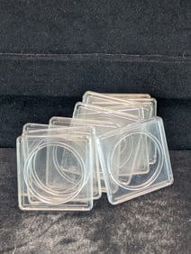 10 assorted plastic 2 X 2 coin holders