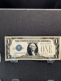 1928 Blue Seal $1 Silver Certificate "Funny Back". Nice Cond.