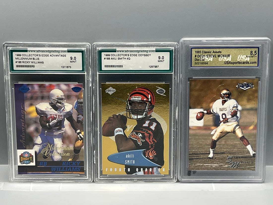 Lot of (3) Assorted Football Slabbed Rookie Cards - Varying Grades - Ricky Williams, Akili Smith, & (1 of 2)