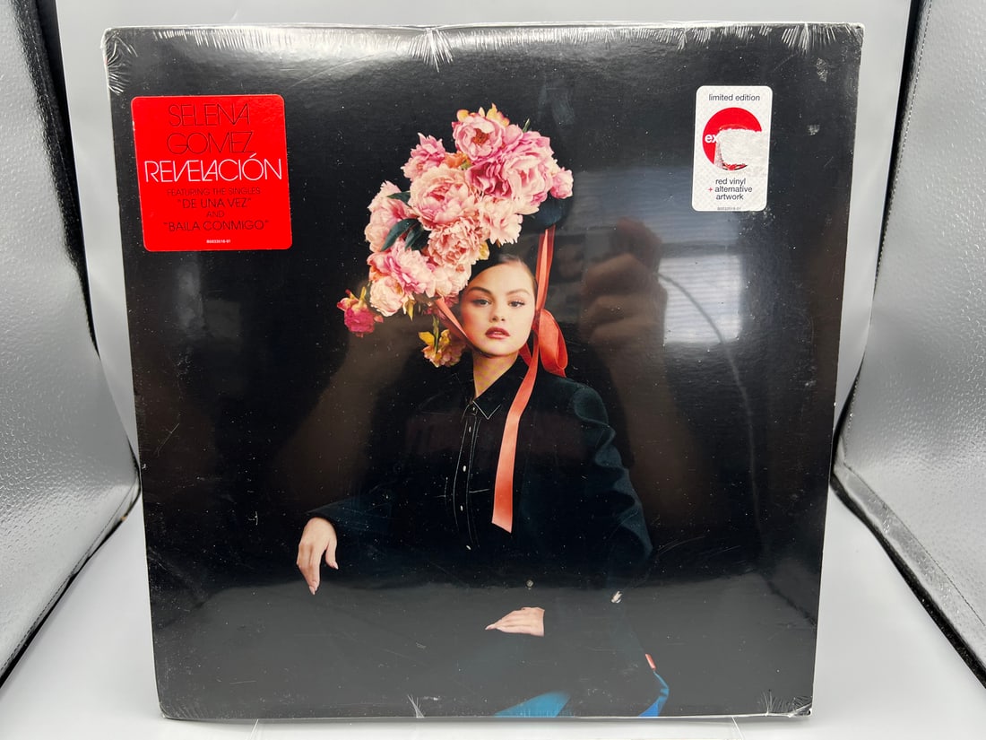 SEALED - Selena Gomez: Revelacion (2021), Limited Edition, red vinyl, alternative cover art: SEALED - Selena Gomez: Revelacion (2021), Limited Edition, red vinyl, alternative cover art - Records have not been tested by the auction house for play quality. All items are sold as is.