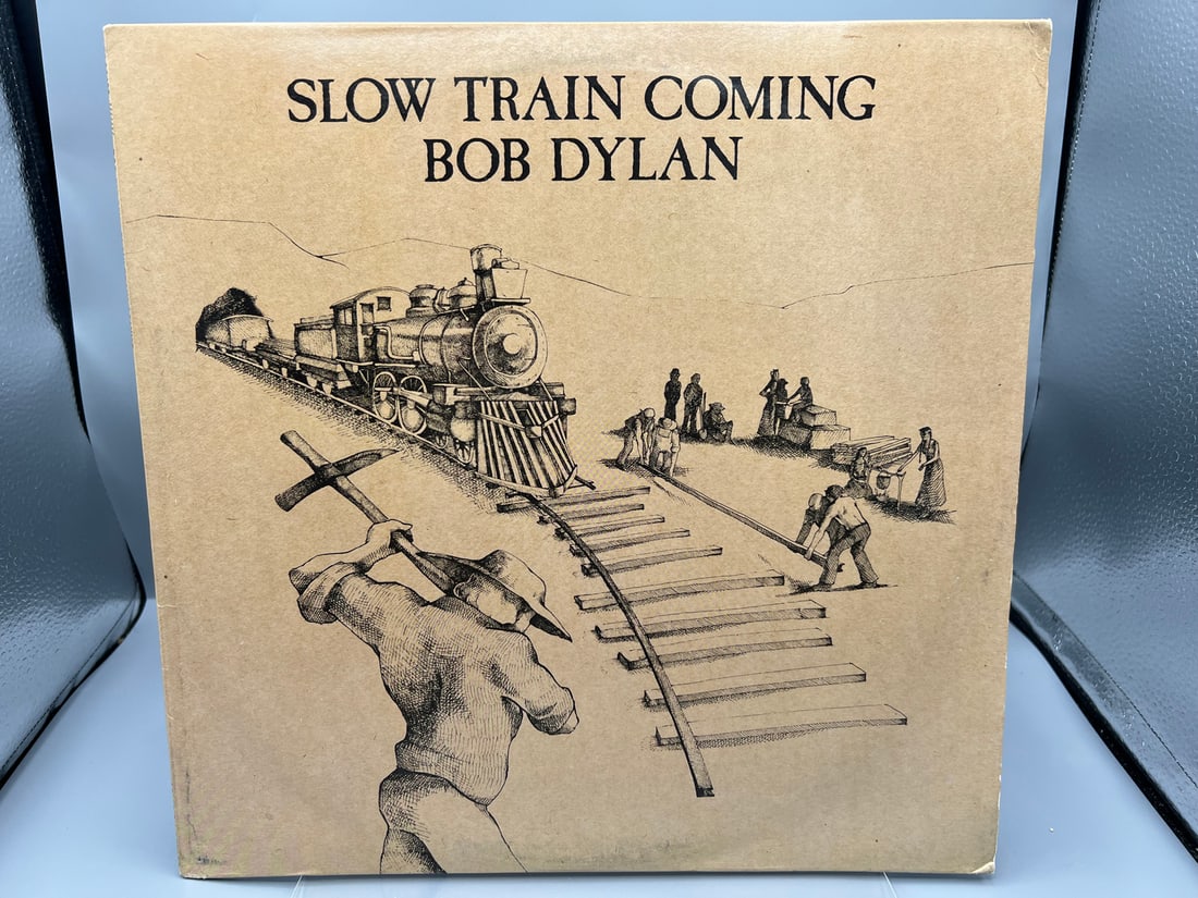 1979 Bob Dylan Slow Train Coming Vinyl Album - PC 36120: 1979 Bob Dylan Slow Train Coming Vinyl Album - PC 36120 - Records have not been tested by the auction house for play quality. All items are sold as is.