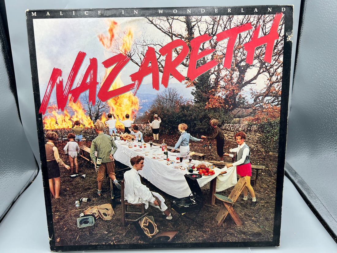 1980 Nazareth Malice In Wonderland Vinyl Album - SP-4799: 1980 Nazareth Malice In Wonderland Vinyl Album - SP-4799 - Records have not been tested by the auction house for play quality. All items are sold as is.