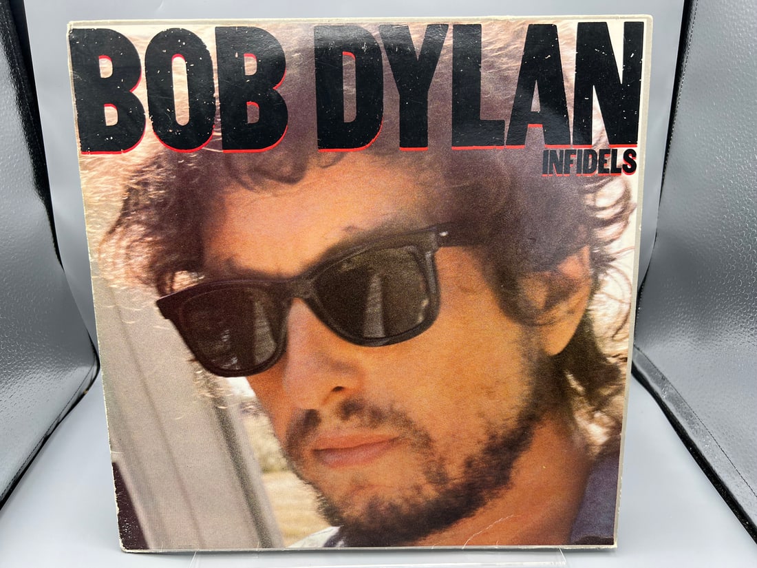 1983 Bob Dylan Infidels Spain Released Vinyl Album - S 25539: 1983 Bob Dylan Infidels Spain Released Vinyl Album - S 25539 - Records have not been tested by the auction house for play quality. All items are sold as is.
