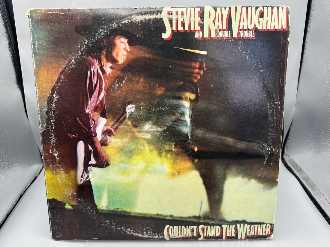 1984 Stevie Ray Vaughan And Double Trouble Couldn't Stand The Weather Vinyl Album - FE 39304: 1984 Stevie Ray Vaughan And Double Trouble Couldn't Stand The Weather Vinyl Album - FE 39304 - Records have not been tested by the auction house for play quality. All items are sold as is.
