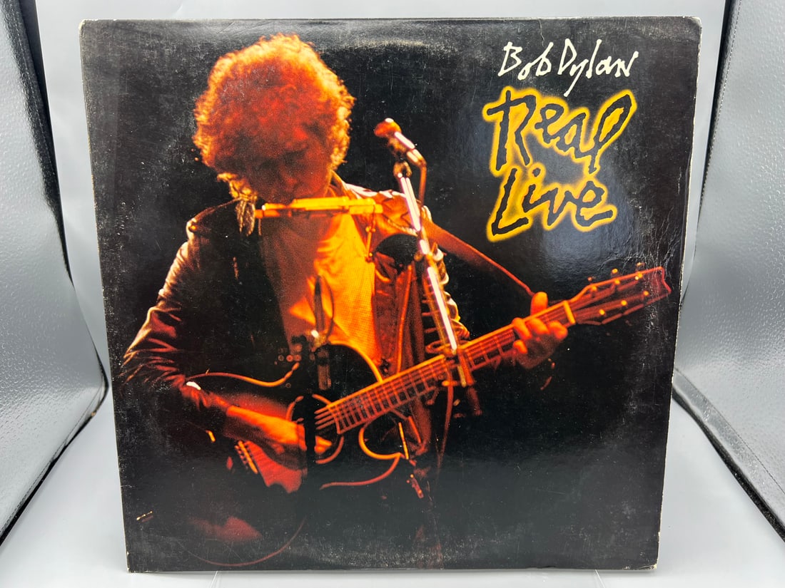 1984 Bob Dylan Real Live Vinyl Album - FC 39944: 1984 Bob Dylan Real Live Vinyl Album - FC 39944 - Records have not been tested by the auction house for play quality. All items are sold as is.