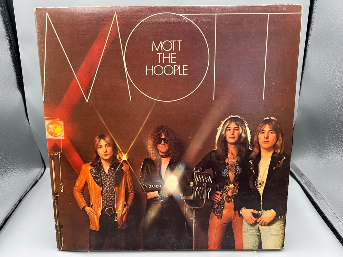 Unknown Release Date Mott The Hoople Reissue Vinyl Album - PC 32425: Unknown Release Date Mott The Hoople Reissue Vinyl Album - PC 32425 - Records have not been tested by the auction house for play quality. All items are sold as is.