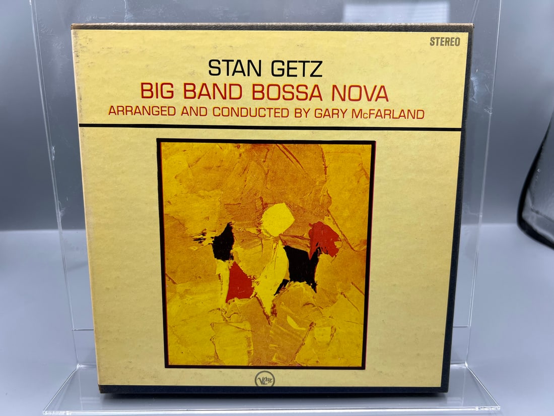 Stan Getz: Big Band Bossa Nova, Reel-to-Reel 4-Track Stereo, 7 1/2 IPS, hinged box shows very minor: Stan Getz: Big Band Bossa Nova, Reel-to-Reel 4-Track Stereo, 7 1/2 IPS, hinged box shows very minor shelf wear - all four corners intact. This is a 4-track reel-to-reel tape - NOT a vinyl record. - Re