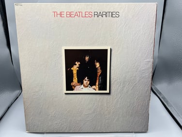 The Beatles: Rarities (1980), cover variation - front cover photo is embossed, no Geroge Martin