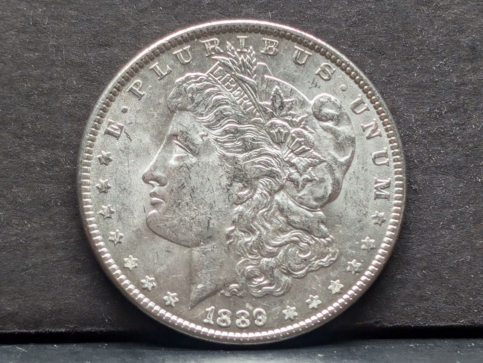 1889 Morgan Silver Dollar  BU (1 of 2)