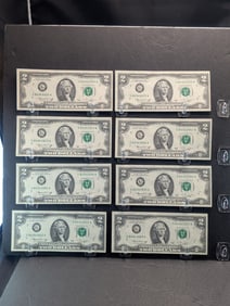 Two groups of 1976 Bicentennial $2s with consecutive serial numbers: four with numbers 924-927 and