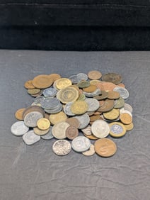 16 ounces plus foreign coins. Nice older mix.