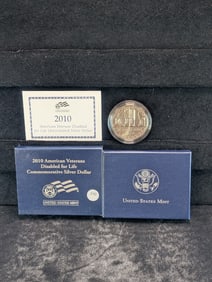 2010-W US Mint American Veterans Disabled For Life Commemorative 90% Silver Dollar. Unc. OGP/COA.
