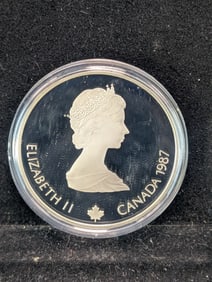 1987 Canada Olympic Winter Games 92.5% Silver $20 Coin (ASW One Troy Ounce)