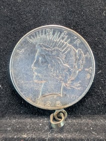 1925 Peace Silver Dollar in Bezel