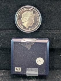 2014 UK Alderney 5 Pound Coin. 92.5% Silver, 28.28 grams