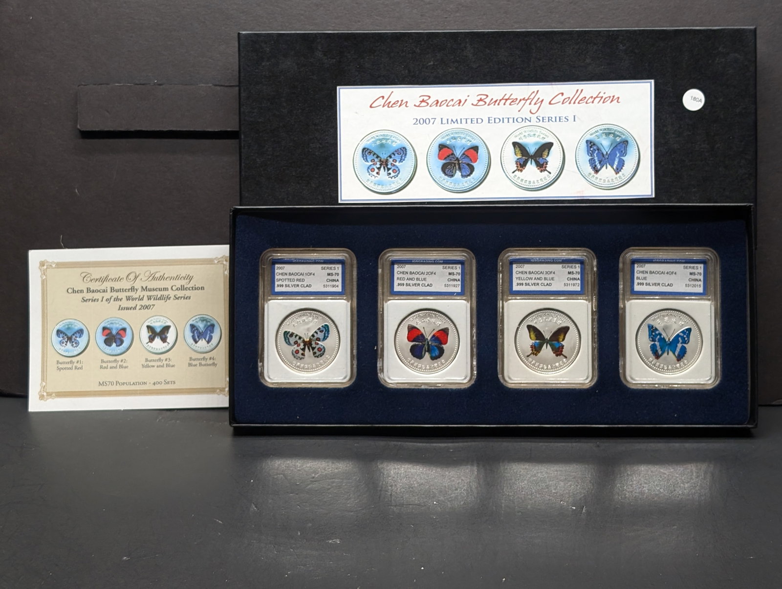 Four Chen Baocai 2007 Butterfly Museum Clad Medals. Slabbed by the International Grading Service as: Four Chen Baocai 2007 Butterfly Museum Clad Medals. Slabbed by the International Grading Service as MS 70. limited to 400 sets. .