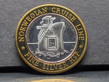 .999 silver center casino token from the Norwegian Cruise Lines. Pictures Neptune.