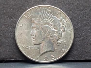 **BETTER DATE - AU58** 1935-P Peace Silver Dollar