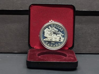 1981 Canada Silver Dollar in OGP - 100th Anniv. of the Trans-Canada Railway